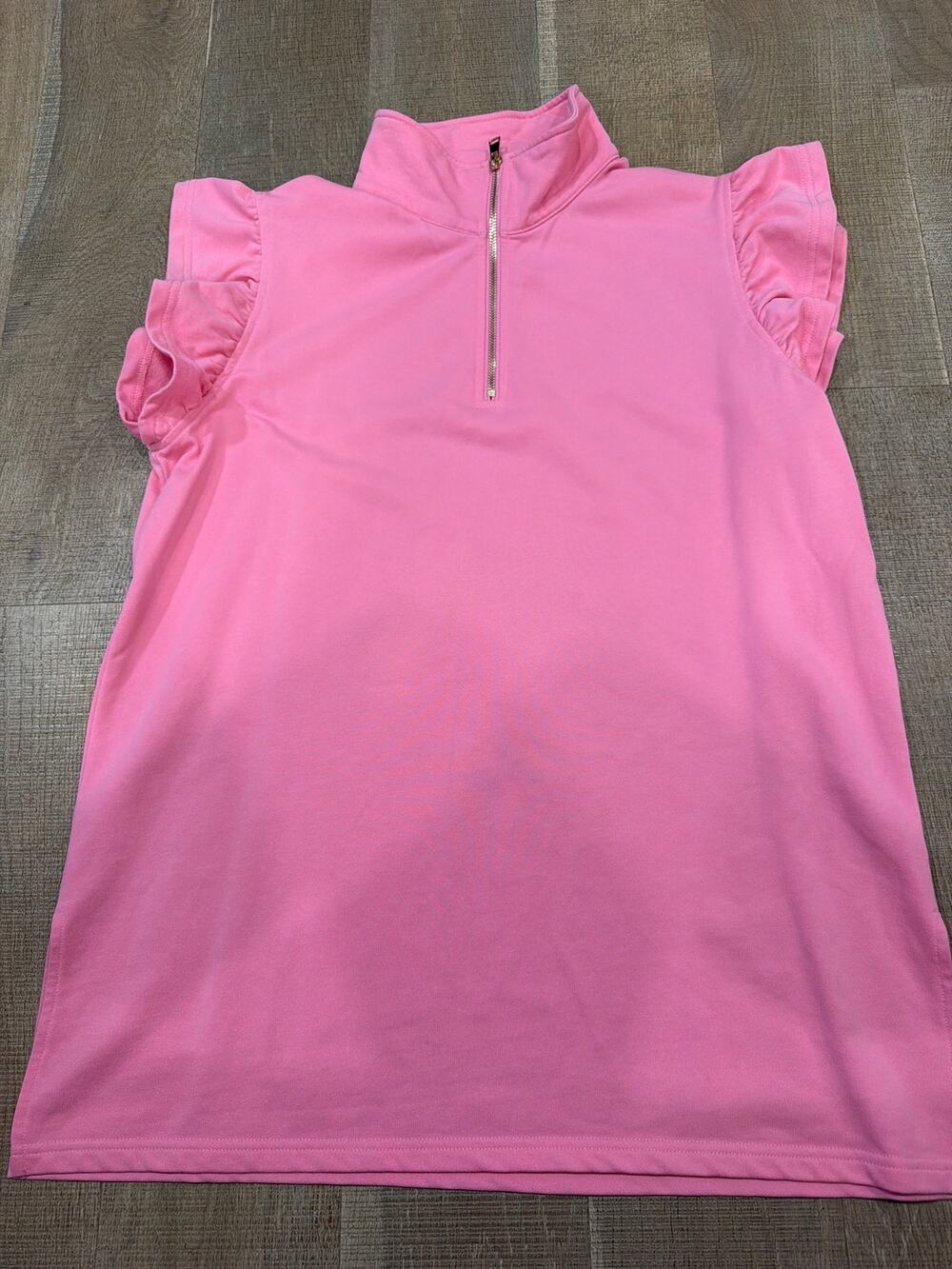 SSYS collared quarter zip with cute ruffle sleeves. This is a great pink color